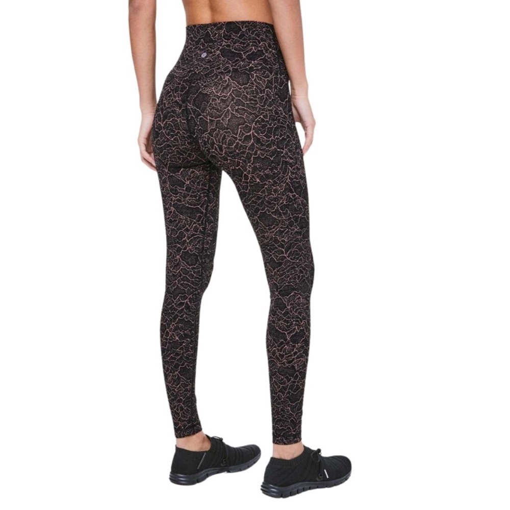Lululemon 7/8 leggings in black and pink lace print